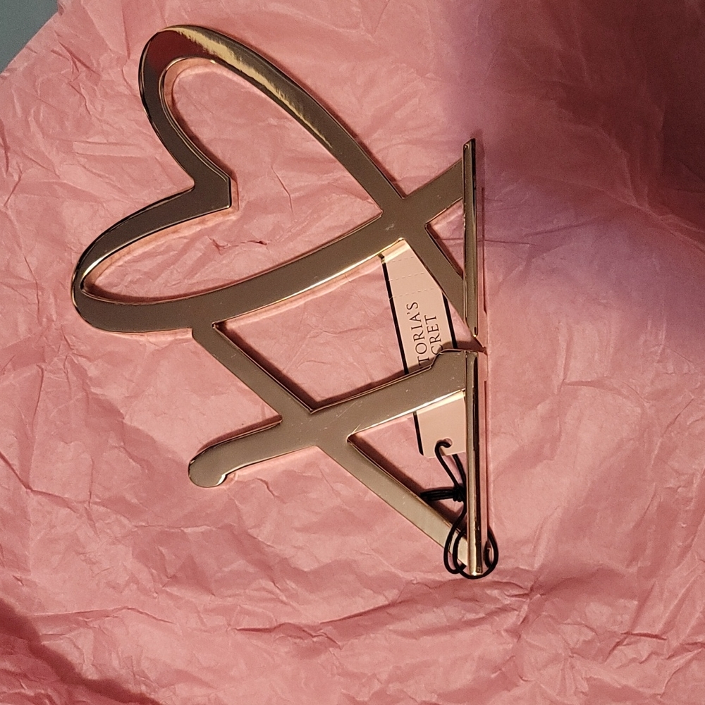 Xo Victoria's secret gold metal decor.  Brand new